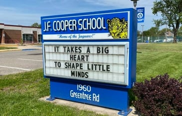 J.F. Cooper School sign