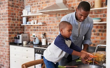 father_and_son_prepping_veggies.jpg