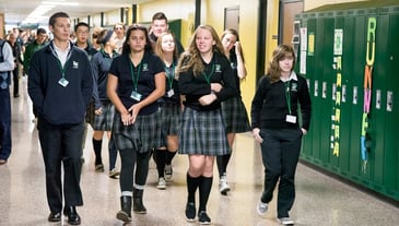 Lumen_Christi_Students_walking_the_halls