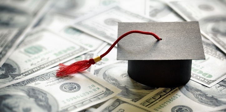 graduation cap with money