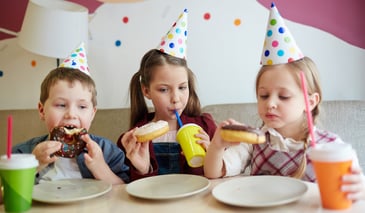 elementary_students_eating_donuts.jpg