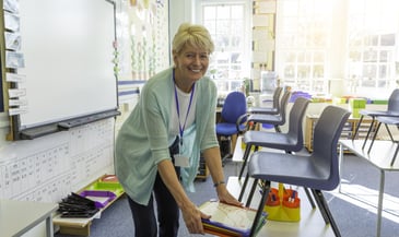 teacher_cleaning_up_classroom_at_the_end_of_the_day