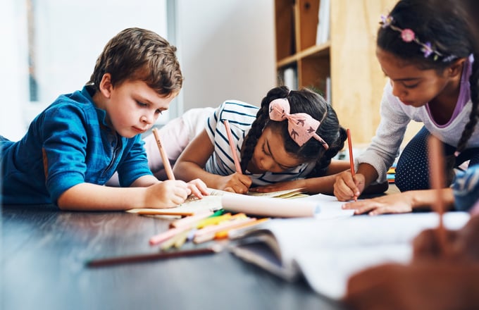 kids writing thank you cards for random acts of kindness week