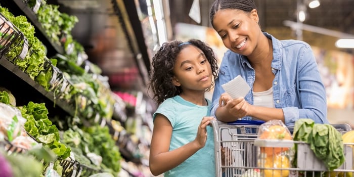 mother-and-daughter-grocery-shop-together-using-list-picture-id936496982