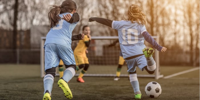 two-female-girl-soccer-teams-playing-a-football-training-match-in-the-picture-id923185900