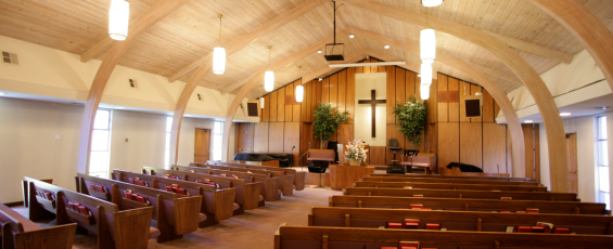 Sanctuary of a church with pews and pulpit