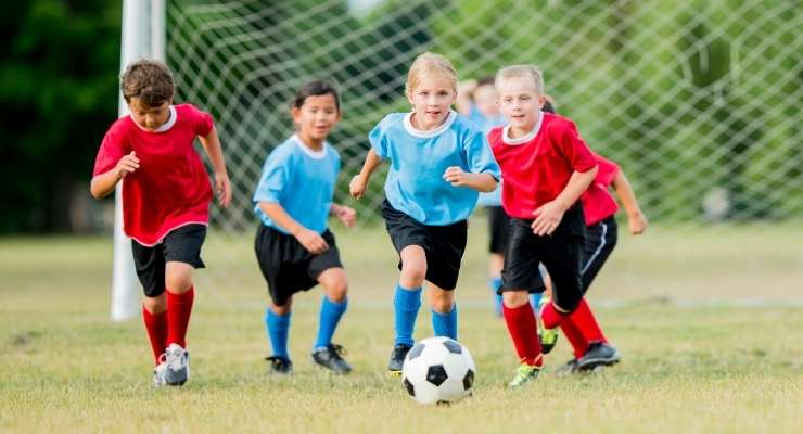 children playing soccer