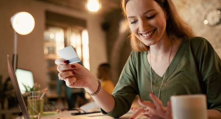 woman prepares to buy a fundraising gift card on her computer